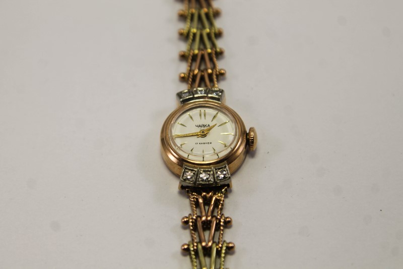 золотые часы «Чайка», проба 583, шесть бриллиантов,  СССР